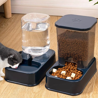 Gravity Pet Feeder & Water Drinker — Deep blue food and water dispensers beside a cat